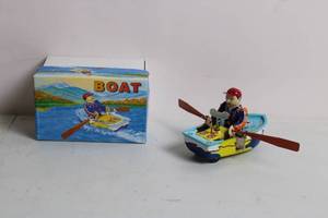 lot 56 image: Vintage Wind-Up Tin Toy Boat with Box
