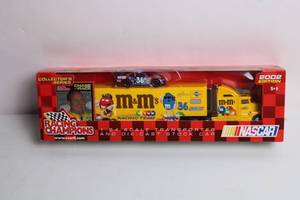 lot 88 image: 2002 NASCAR Racing Champions M&Ms Collectors Edition Transporter and Die-Cast Car