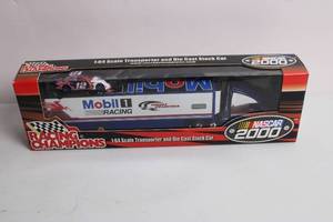 lot 90 image: Racing Champions NASCAR 2000 Transporter and Die Cast Stock Car