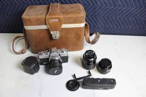 lot 101 image: Minolta Vintage Camera with Lenses and Carry Case