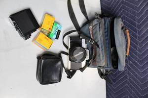 lot 103 image: Minolta Film Camera with Accessories and Tamrac Camera Bag