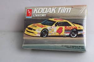 lot 143 image: Unopened 125 Kodak Film Chevrolet Model Kit