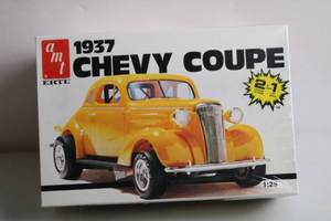 lot 144 image: 1937 Chevy Coupe 125 Scale Model Kit by AMT Ertl