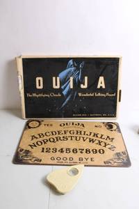 lot 229 image: Vintage William Fuld Ouija Board with Planchette