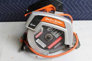 lot 275 image: Black & Decker 7 Circular Saw with 1 HP Motor