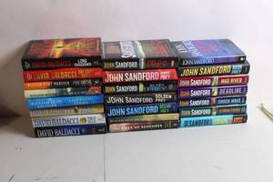 lot 287 image: Collection of 24 Thriller and Mystery Hardcover Books by David Baldacci, John Sandford, and William Kent Krueger
