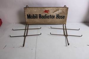 lot 295 image: Vintage Mobil Radiator Hose Metal Display Rack