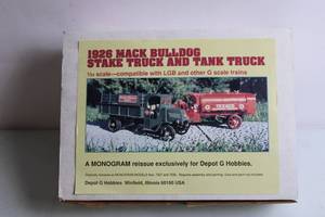lot 300 image: 1926 Mack Bulldog Stake Truck and Tank Truck 124 Scale Model Kit