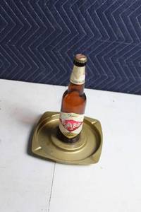 lot 309 image: Vintage Grain Belt Beer Bottle and Metal Ashtray