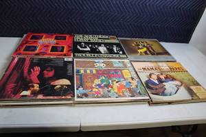 lot 318 image: Collection of 12 Classic Vinyl Records Featuring Various Artists
