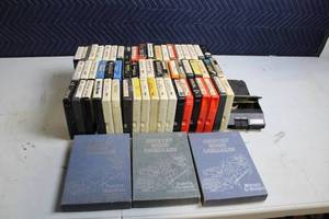 lot 319 image: Collection of Vintage Country Music 8-Track Tapes with Cases