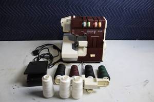 lot 327 image: Singer Hobbylock 784 Electronic Serger with Accessories