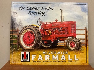 lot 10 image: McCormick Farmall Metal Sign