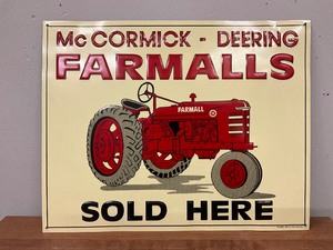lot 11 image: 1992 Farmall Deering Metal Sign
