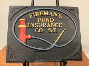lot 26 image: Firemans Fund Insurance Cast Iron Plaque