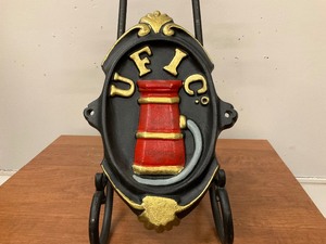 lot 27 image: UFIC Cast Iron Plaque