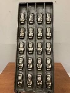 lot 47 image: Vintage Chocolate Metal Santa Mold