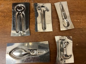 lot 51 image: 5 Tool Shaped Metal Candy Molds