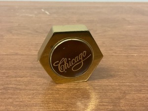 lot 103 image: Chicago Brass Shaped Paperweight