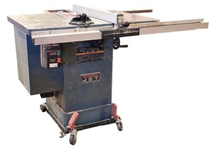 lot 5 image: Jet Industrial Table Saw with Rolling Base and Adjustable Fence