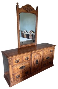 lot 93 image: Vintage Wooden Dresser with Mirror and Decorative Carvings