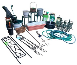 lot 150 image: Comprehensive Gardening Lot with Planters, Trellises, and Tools