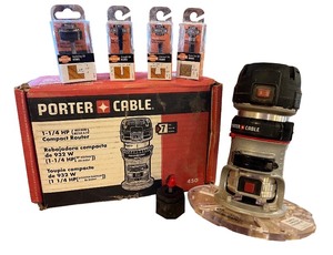 lot 193 image: Porter-Cable 1-14 HP Compact Router with 4 Extra Bits