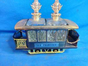 lot 50 image: Vintage San Francisco Musical Trolley Decanter