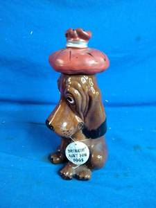 lot 53 image: Vintage Enesco Hound Dog Decanter Drinkin Aint for Dogs Barware