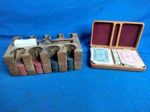 lot 54 image: Vintage 1940s era clay poker chips wooden holder and vintage wooden playing card and dice box, which includes two decks of playing cards and dice.