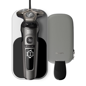 lot 24 image: Philips Norelco Series Prestige Wet and Dry Electric Shaver with Qi Charger
