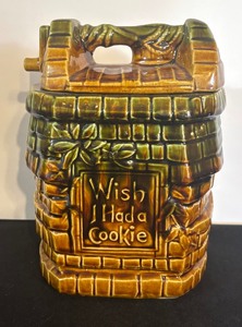 lot 111 image: Vintage McCoy Wish I had a Cookie Wishing Well Cookie Jar