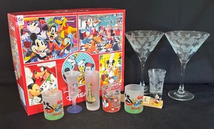 lot 154 image: Mickey Mouse Themed Items including Puzzles, Stemware, Cordial Glasses and Sign