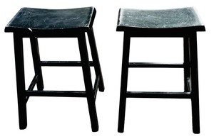 lot 45 image: Two Vintage Black Wooden Saddle Stools