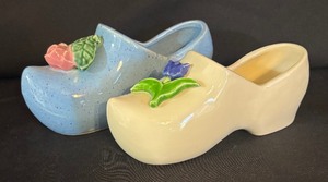 lot 170 image: Vintage McCoy Pottery Shoe Figurines  Klomp Planters