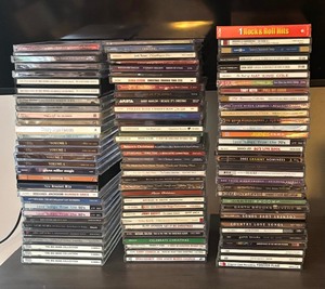 lot 149 image: CDs Galore including Toby Keith, Rock & Roll Hits, Garth Brooks and More