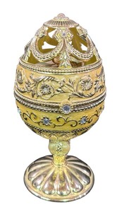 lot 552 image: Gorgeous Jane Seymour Enamel & Crystal Jeweled Rotating Cherub Egg Music Box