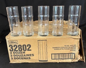 lot 559 image: 25 Libbey Bamboo Cooler Glasses  Vases