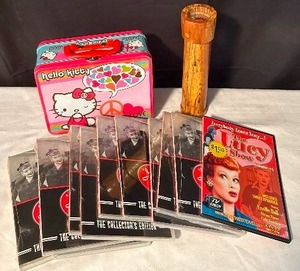 lot 573 image: Fun Vintage Finds, Including I Love Lucy DVDs, Wooden Kaleidoscope, and More