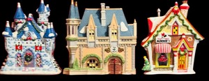 lot 390 image: Ceramic Disney Lighted Castle and More including Disney Ceramic Building Mickeys Christmas Carol