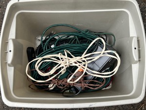 lot 482A image: Bin of Electric Extension Cords and More