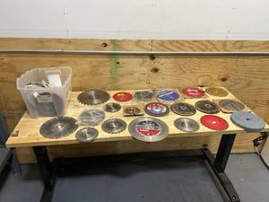 lot 54 image: Large Lot of Various Saw Blades, Grinding Wheels, Cutoff Wheels etc..