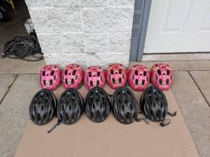 lot 4 image: ASSORTED BOYSGIRLS BIKE HELMETS (11 TOTAL)