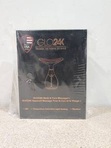 lot 16 image: NEW GLO 24K NECK & FACE MASSAGER