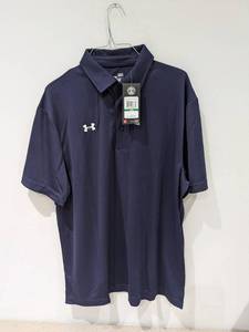 lot 70 image: NEW UNDER ARMOUR LARGE GOLF POLO (BLUE)