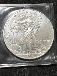 lot 09 image: 2016 AMERICAN SILVER EAGLE 1 TROY OZ .999 FINE SILVER