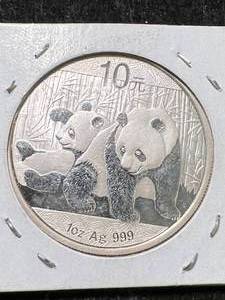 lot 14 image: 2010 CHINESE PANDA 1 TROY OZ .999 FINE SILVER