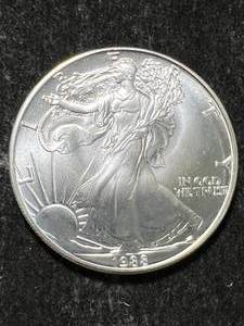 lot 33 image: 1988 AMERICAN SILVER EAGLE 1 TROY OZ .999 FINE SILVER