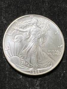 lot 50 image: 1986 AMERICAN SILVER EAGLE 1 TROY OZ .999 FINE SILVER