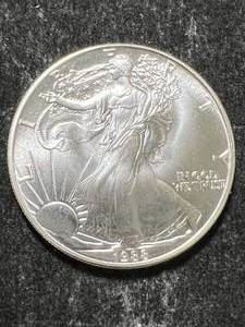 lot 69 image: 1988 AMERICAN SILVER EAGLE 1 TROY OZ .999 FINE SILVER
